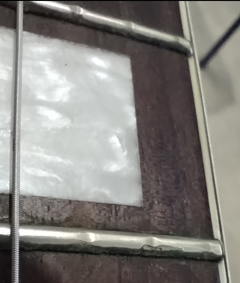 Worn frets - replace or file down?-screenshot-2026-03-23-13-48-17-png