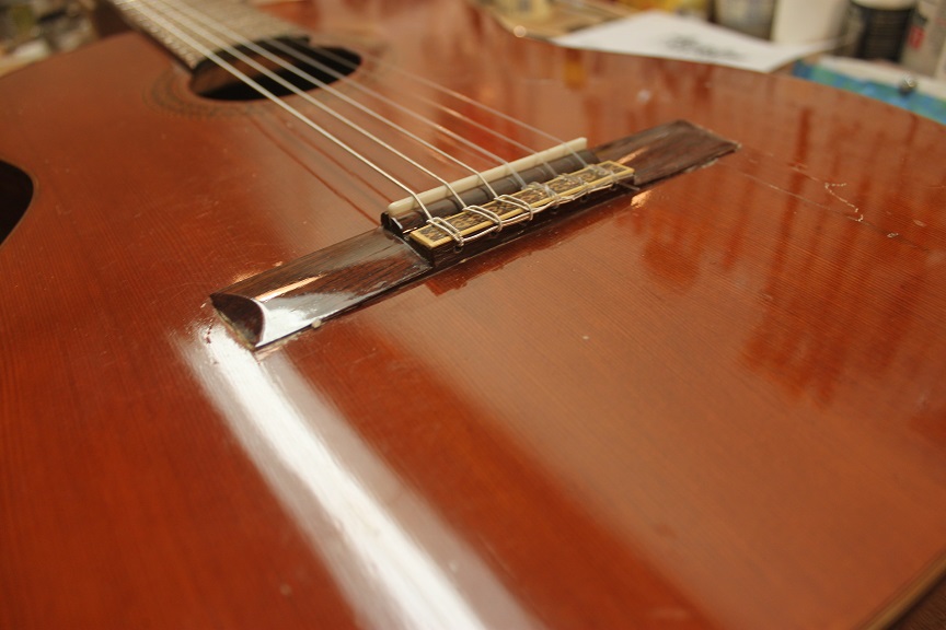 Reattaching a bridge to a nylon string guitar-img_4778-jpg