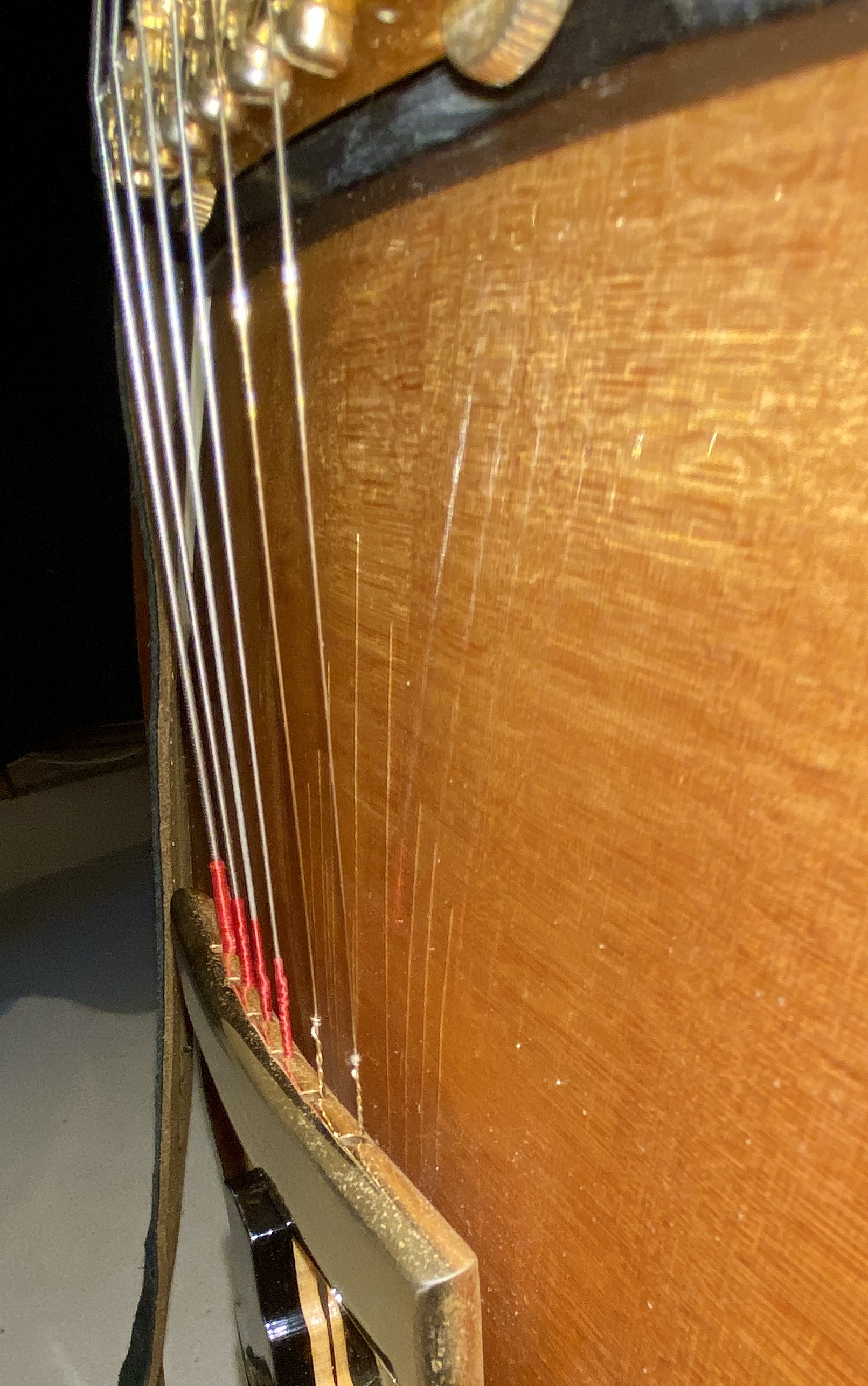 Guitar cracks or checks or damage - please help a clueless idiot-856c4468-a248-44da-9638-ad2c8eec0d41-jpeg