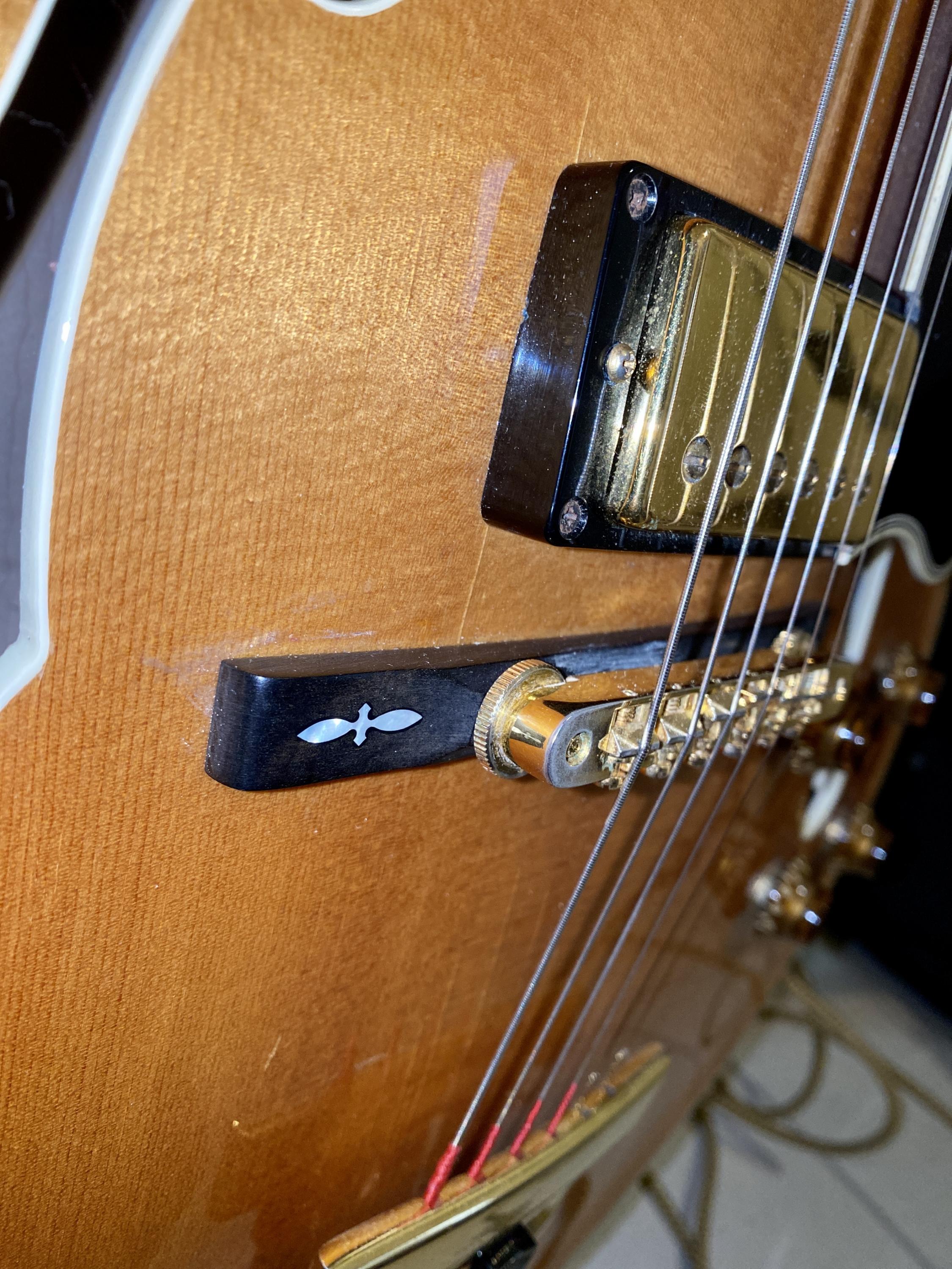 Guitar cracks or checks or damage - please help a clueless idiot-ff8a6a10-affc-4676-89b1-284a10d21a97-jpg