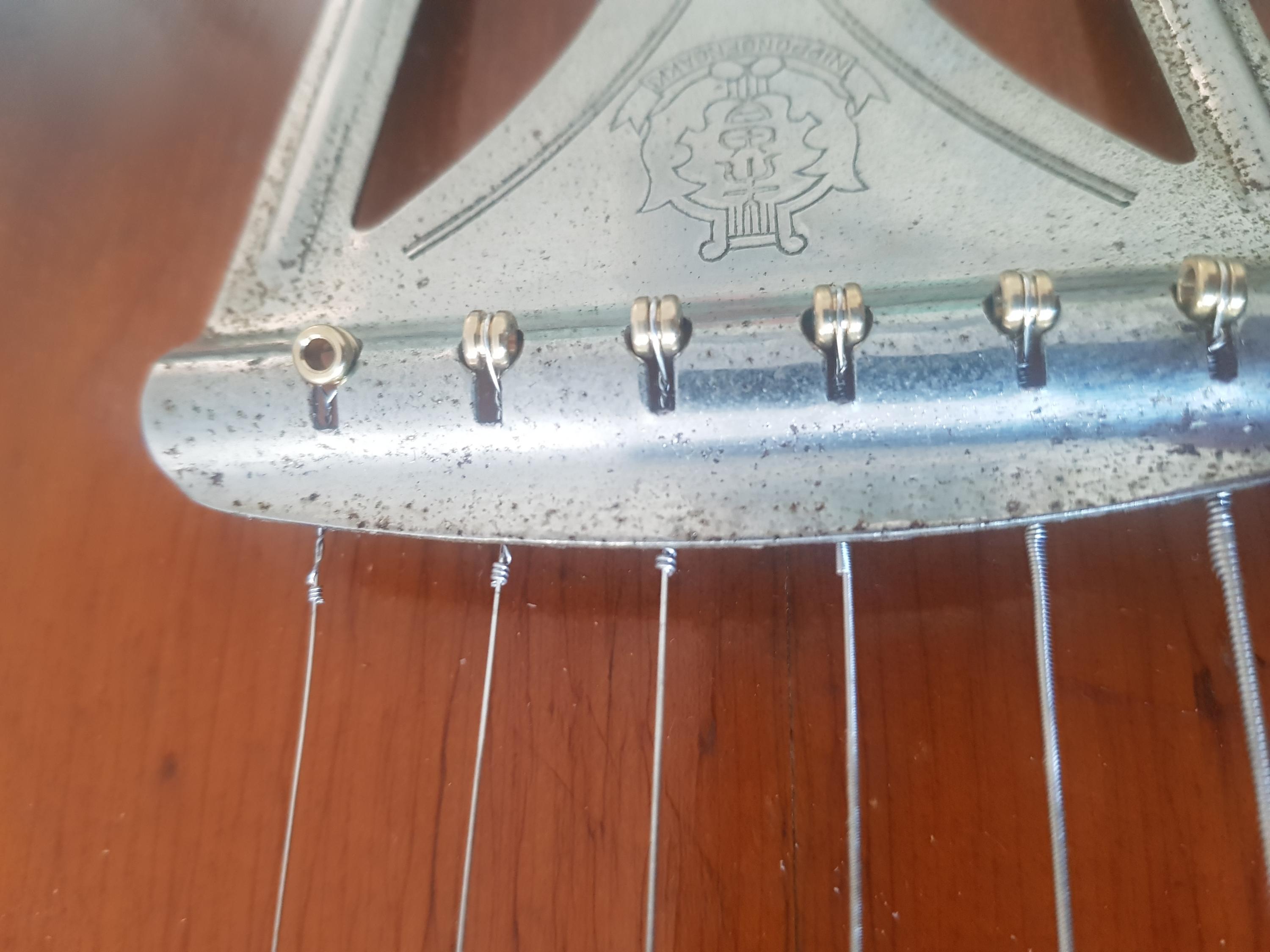 How should I thread a string through this tailpiece?-20231126_191717-jpg