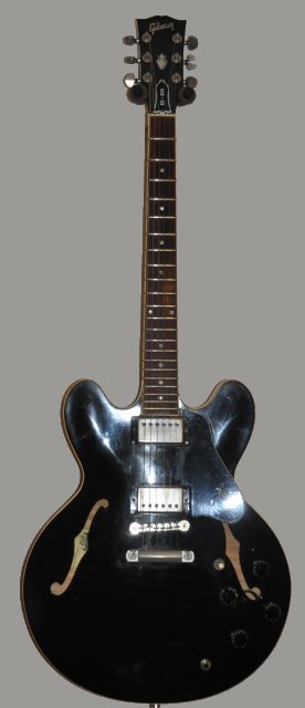 Would you buy a vintage guitar with a repaired headstock break?-gibson_es335_blk_2000-jpg