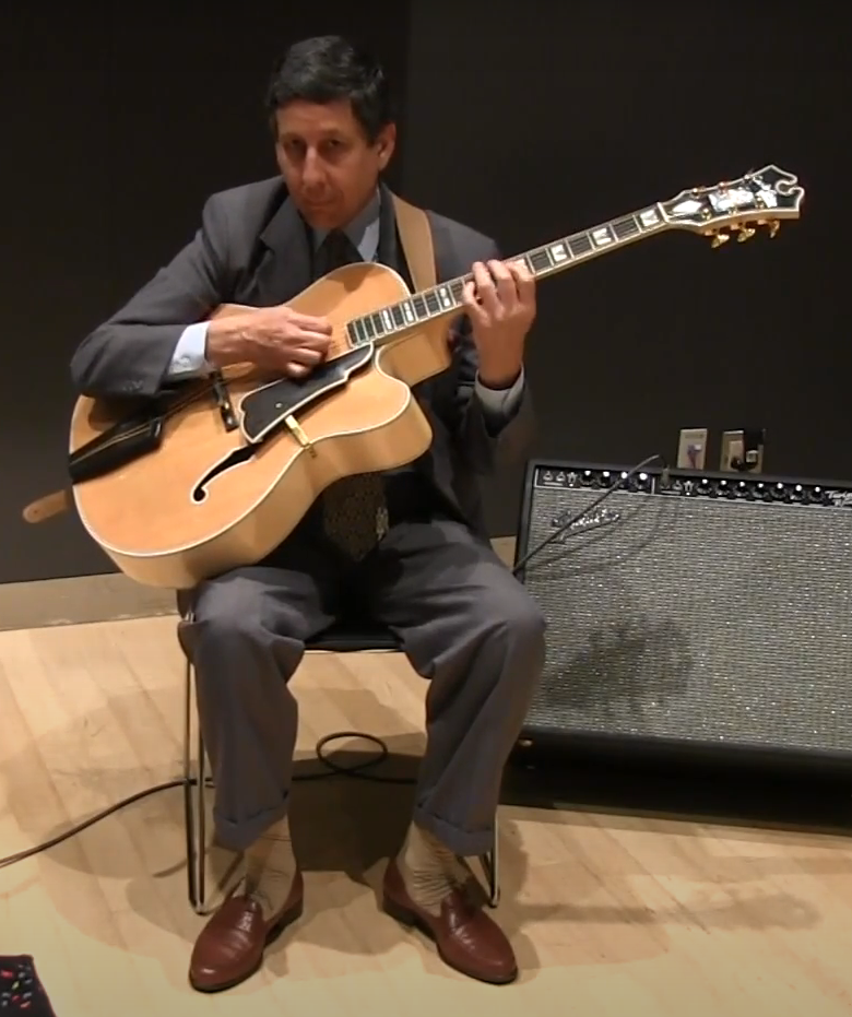 335 too big - ?-guitar-seated-position-big-archtop-png