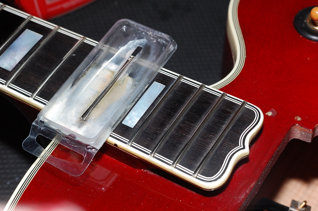 This Guitar Collection Is Begging for a Red L-5CES-polishing-frets-jpg