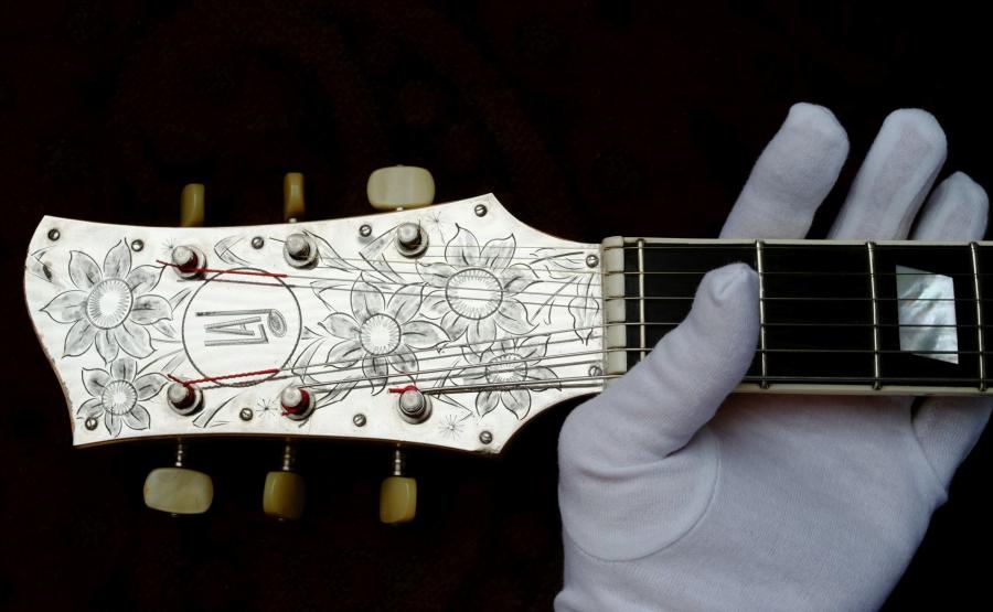 You just got a large sum of money and are buying a guitar-dscf0980c-jpg