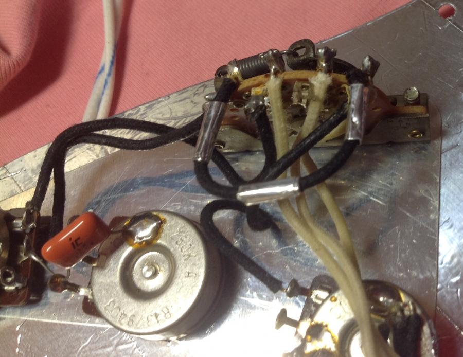 How do I get rid of Static in my Pickguard?-image-jpg