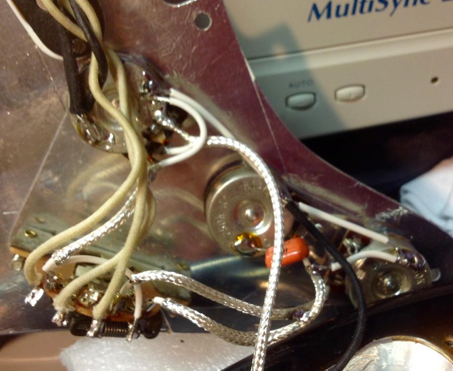 How do I get rid of Static in my Pickguard?-image-jpg