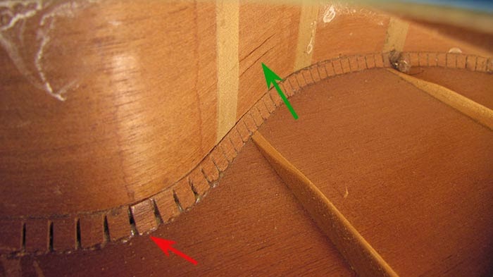 a look inside an ES-300-gibson-tg-1-tenor-guitar-side-damage-interior-detail-bracing-cracks-jpg