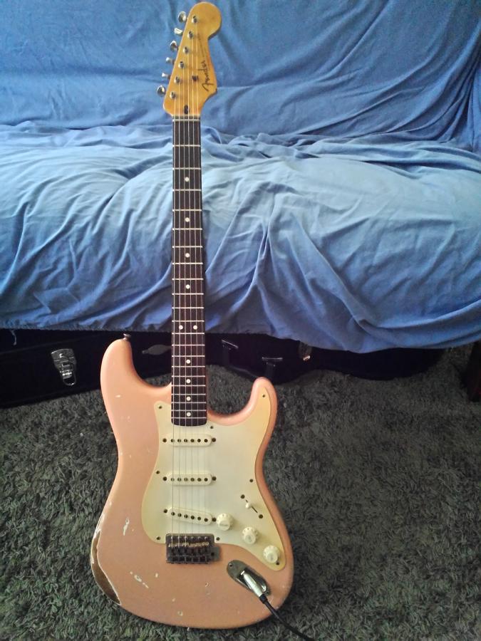 The Difference Between Fender Stratocaster and Telecaster-pink-relic-strat-jpg