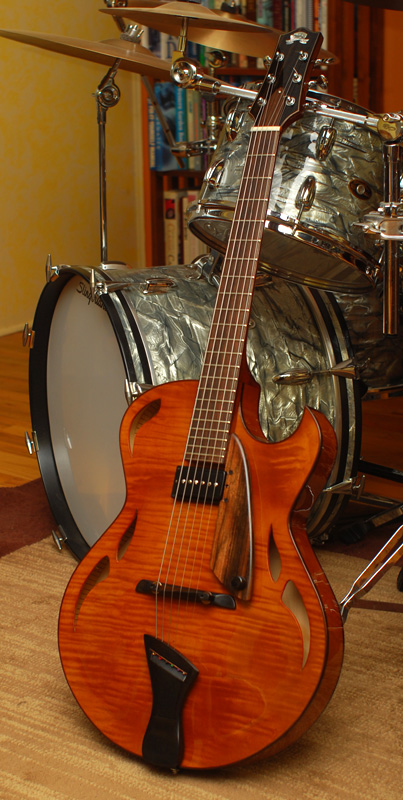 Odd question - electric archtops with “thin” f-holes?-holst-orange-ish-jpg