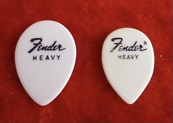 Why do jazz guitarists use small picks?-793e0f5a-4d0e-4346-b1c9-355ac2b3a389-jpeg