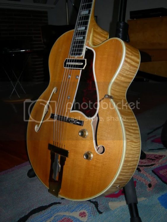 Why do jazz guitarists like to play hollow-body guitars?-952dec35-4141-4431-b59f-bfb46e4ef111-jpeg