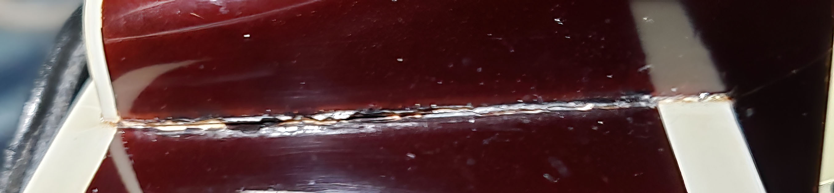 How likely is a hand carved archtop surviving a week lost in 12&deg;F weather???-neck-crack-closeup-jpg