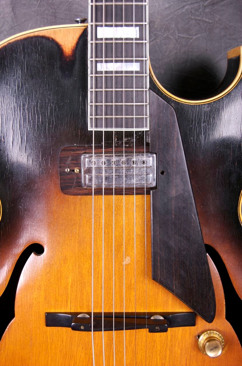 Why do vintage jazz guitars often show wear on the bass side upper bout?-jimhall-jpg