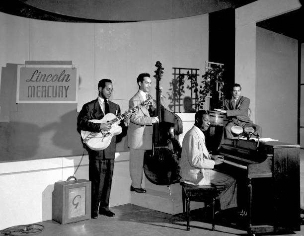 When did jazz guitarists start standing up?-gettyimages-74284799-612x612-jpg