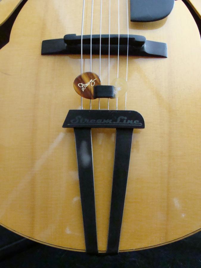 Fingerpicking with pick in hand-wedgie-holder-jpg