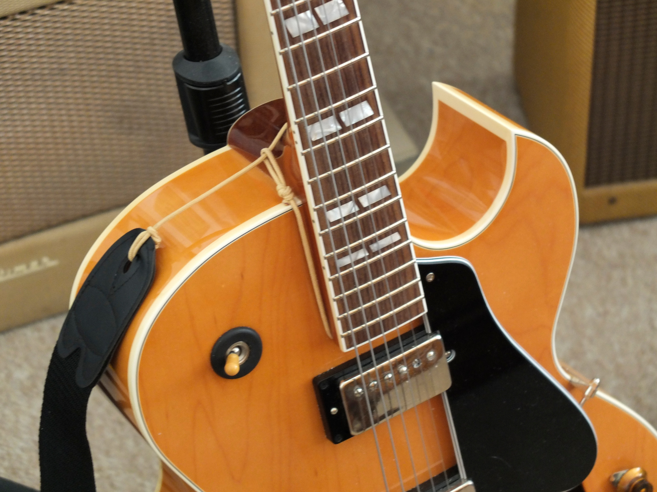 Wes Montgomery's Guitar Strap strapped at the head stock guitar facing up at you.-guitar_strap_sm-jpg