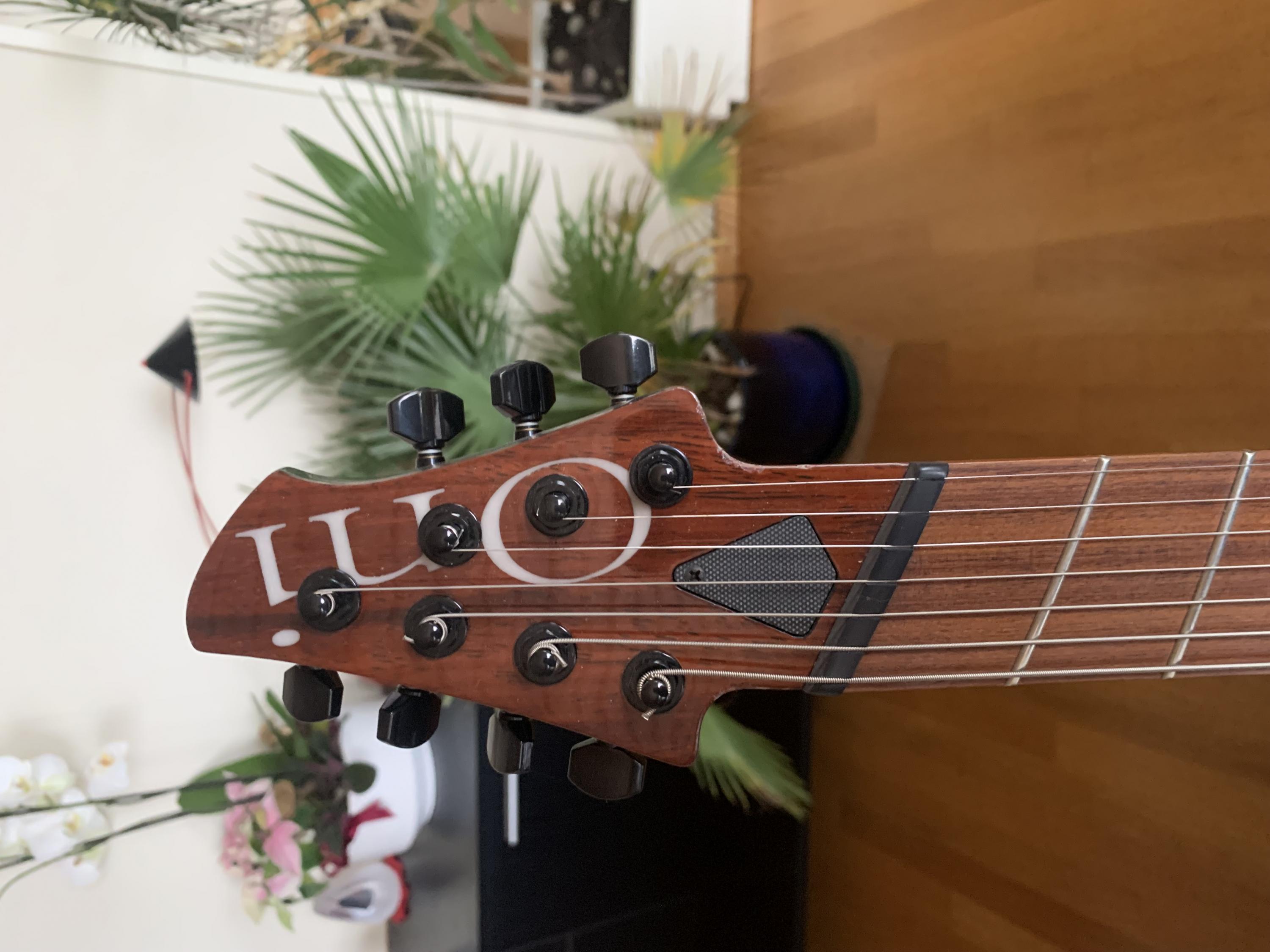 Used Oni Singlecut Multiscale solid body 7-string guitar-head-stock-jpg